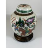 A LATE 19TH/EARLY 20TH CENTURY CHINESE CRACKLE GLAZE WARRIOR DESIGN GINGER JAR ON CARVED WOODEN