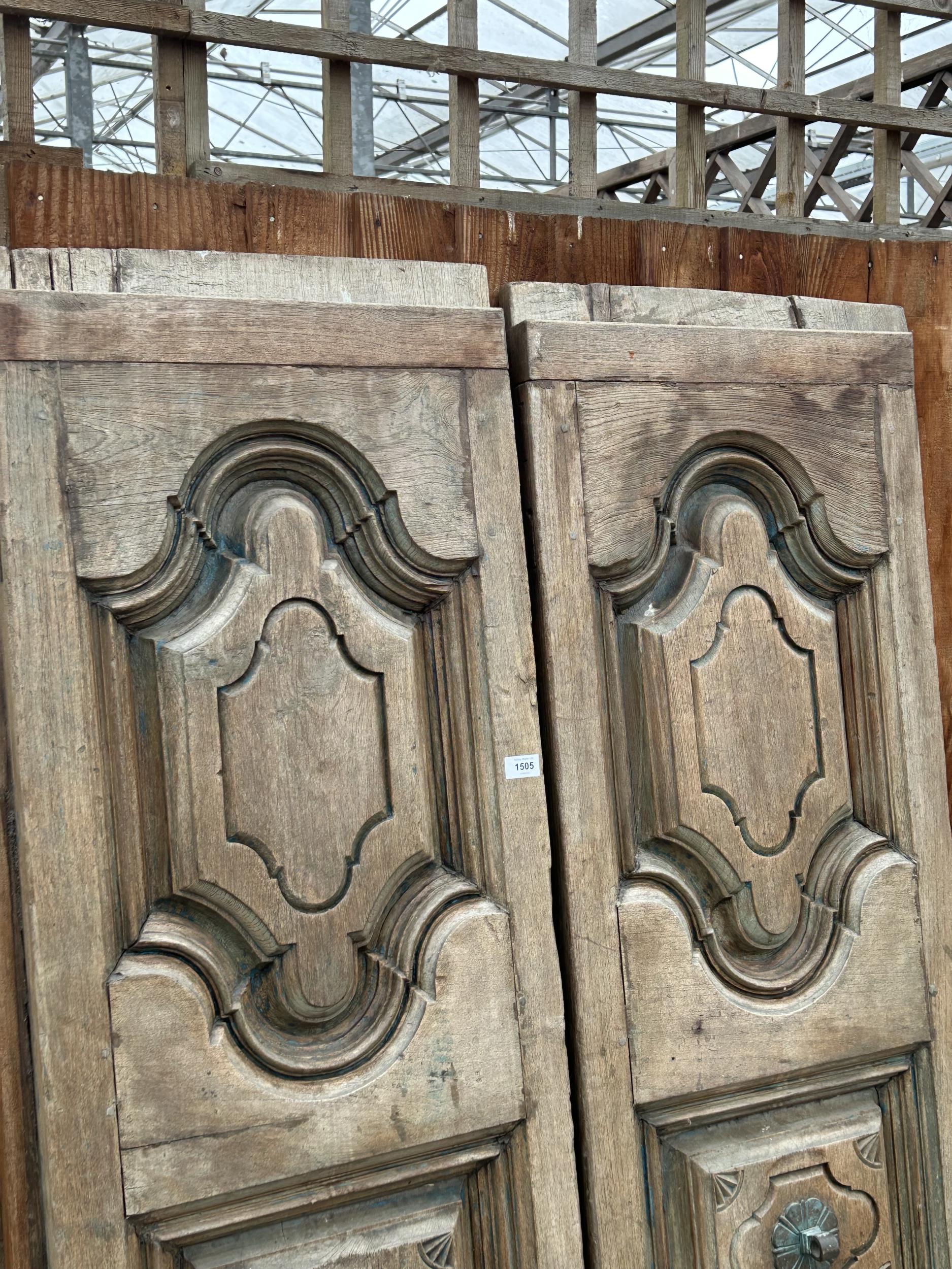 A PAIR OF INDIAN HARDWOOD PANELLED DOORS WITH BRASS HANDLES (ONE PIECE MISSING) 77 X 41" - Image 2 of 4