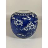 AN EARLY 20TH CENTURY CHINESE BLUE AND WHITE PRUNUS BLOSSOM GINGER JAR, DOUBLE RING MARK TO BASE,