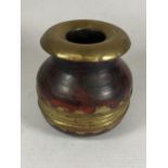 A DECORATIVE MIDDLE EASTERN WOODEN AND BRASS INK POT, HEIGHT 12CM
