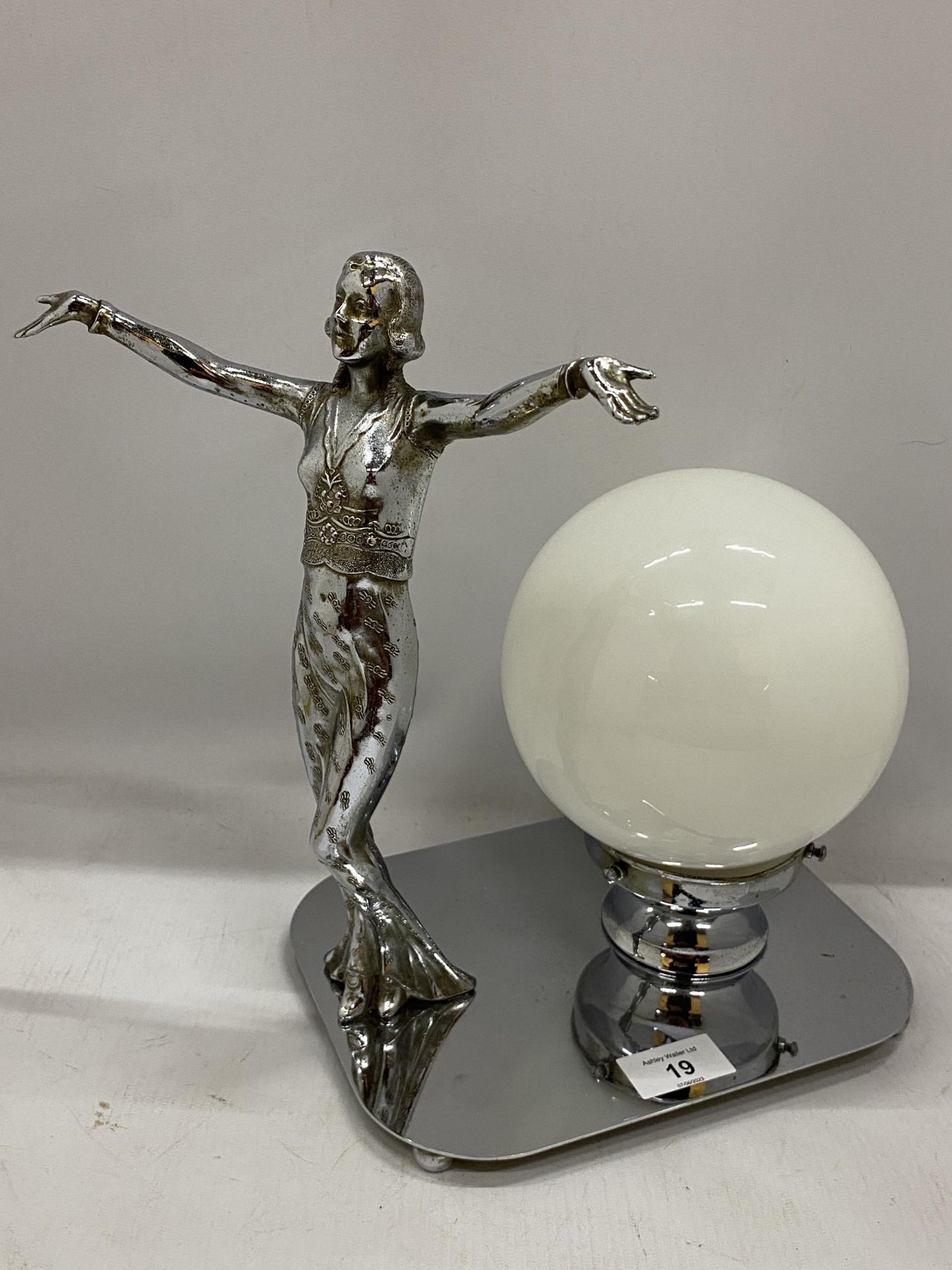 AN ART DECO CHROME LADY LAMP WITH WHITE GLASS DOME SHADE AND SPARE SHADE, HEIGHT 30CM