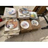 A LARGE ASSORTMENT OF CERAMIC COLLECTORS PLATES