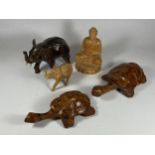 A GROUP OF ORIENTAL CARVED WOODEN FIGURES, SEATED BUDDHA, TURTLES AND TWO ELEPHANTS