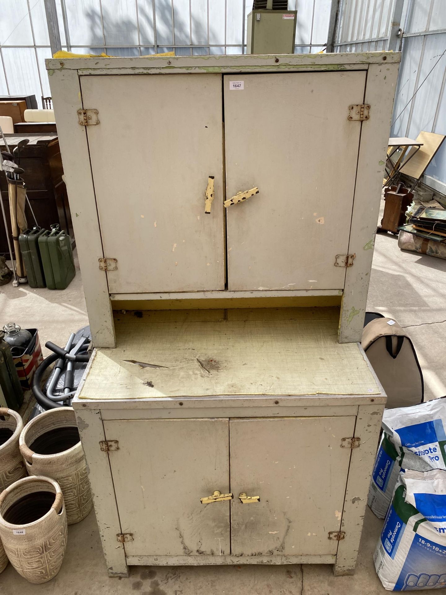 A RETRO METAL KITCHEN CUPBOARD