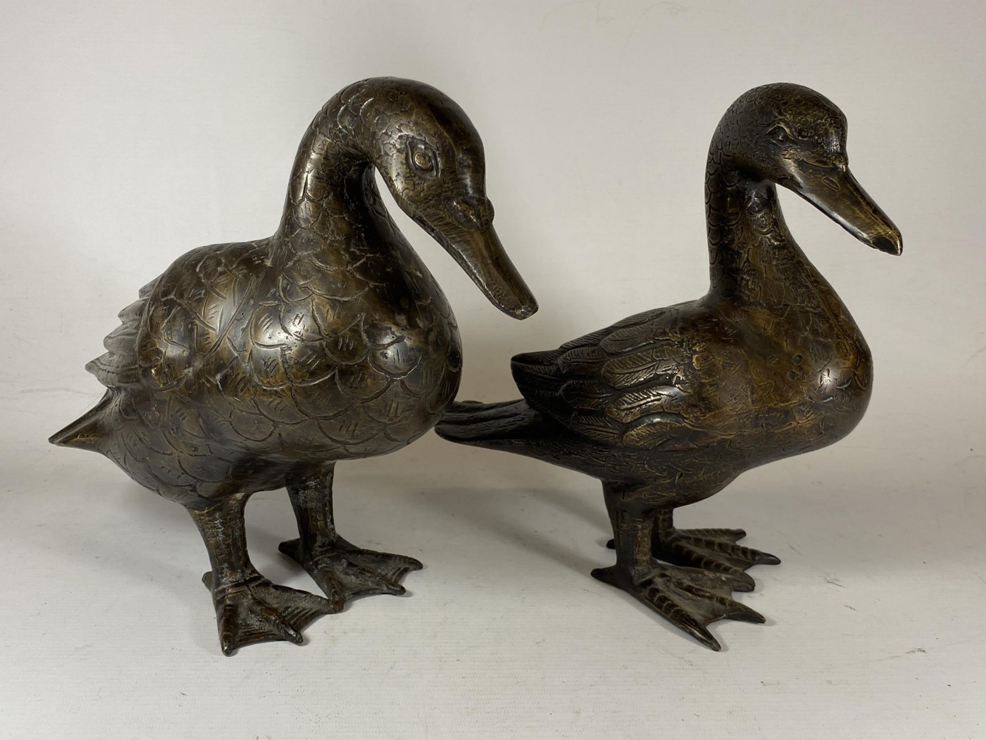 A PAIR OF ORIENTAL SPELTER DUCK MODELS, UNSIGNED, HEIGHT 27CM