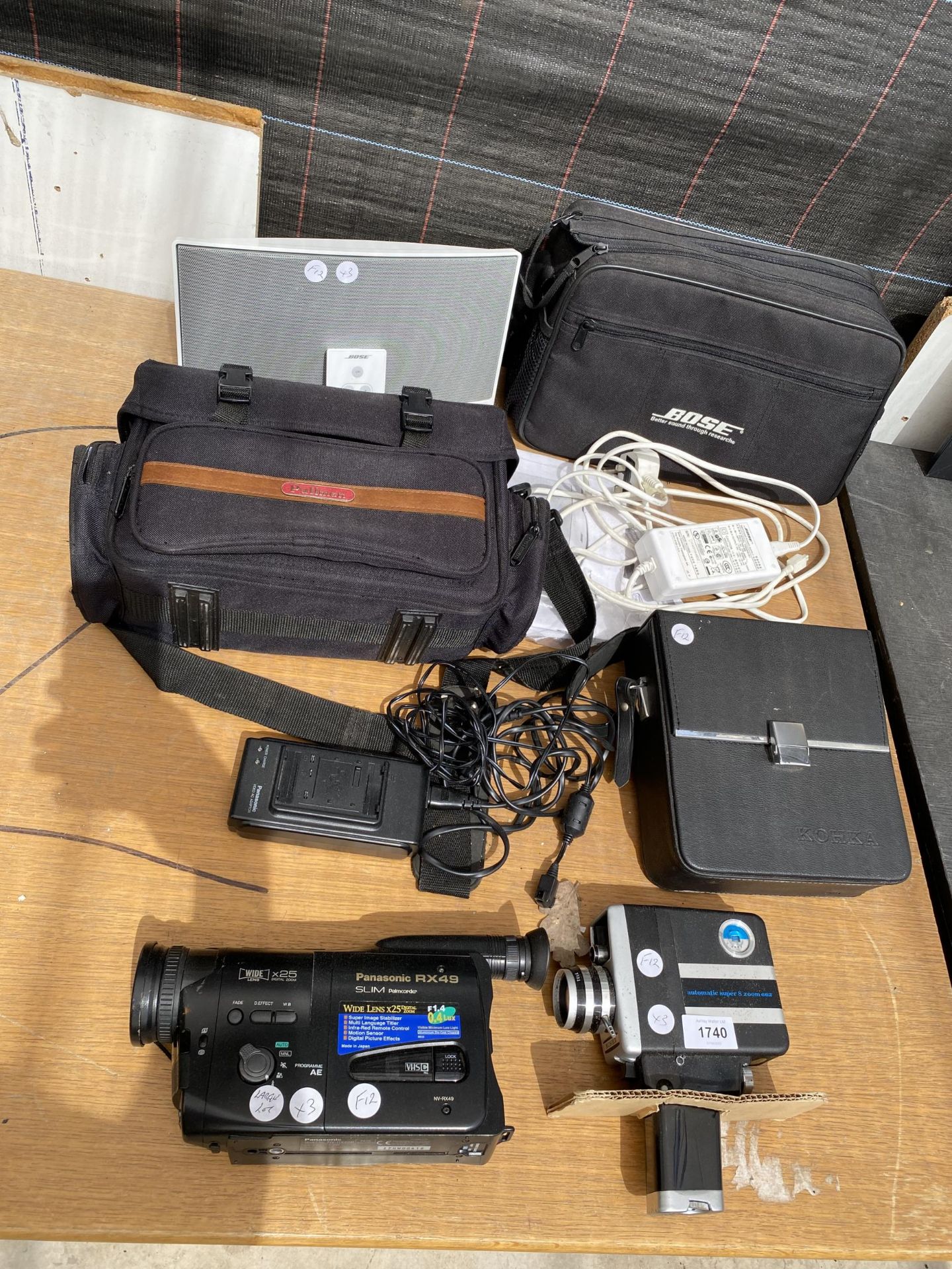 AN ASSORTMENT OF ELECTRICAL EQUIPMENT TO INCLUDE A PANASONIC CAMCORDER AND A BOSE DOCKING STATION