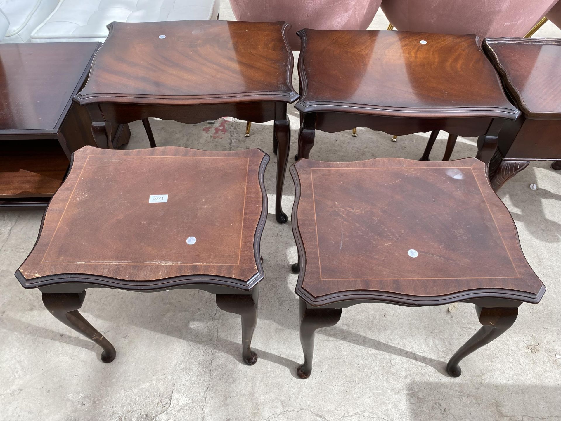 TWO PAIRS OF MAHOGANY LAMP TABLES ON CABRIOLE LEGS