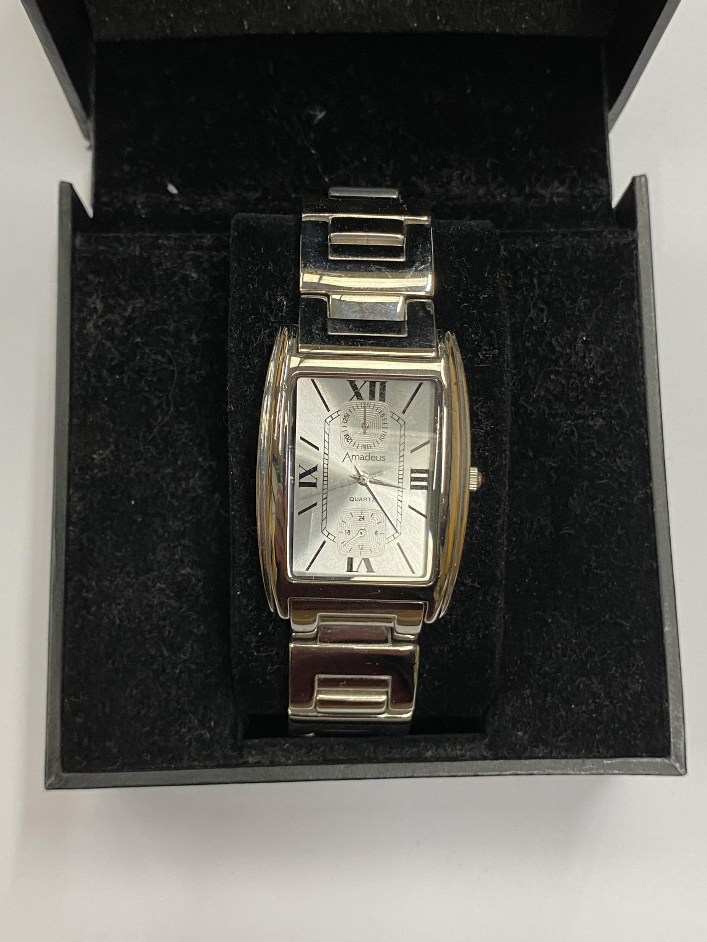 A BOXED GENTS AMADEUS TANK STYLE WATCH, WORKING WHEN CATALOGUED BUT NO WARRANTIES GIVEN