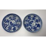 A PAIR OF KANGXI PERIOD (1661-1722) CHINESE BLUE AND WHITE PORCELAIN PLATES, ARTEMESIA LEAF MARK