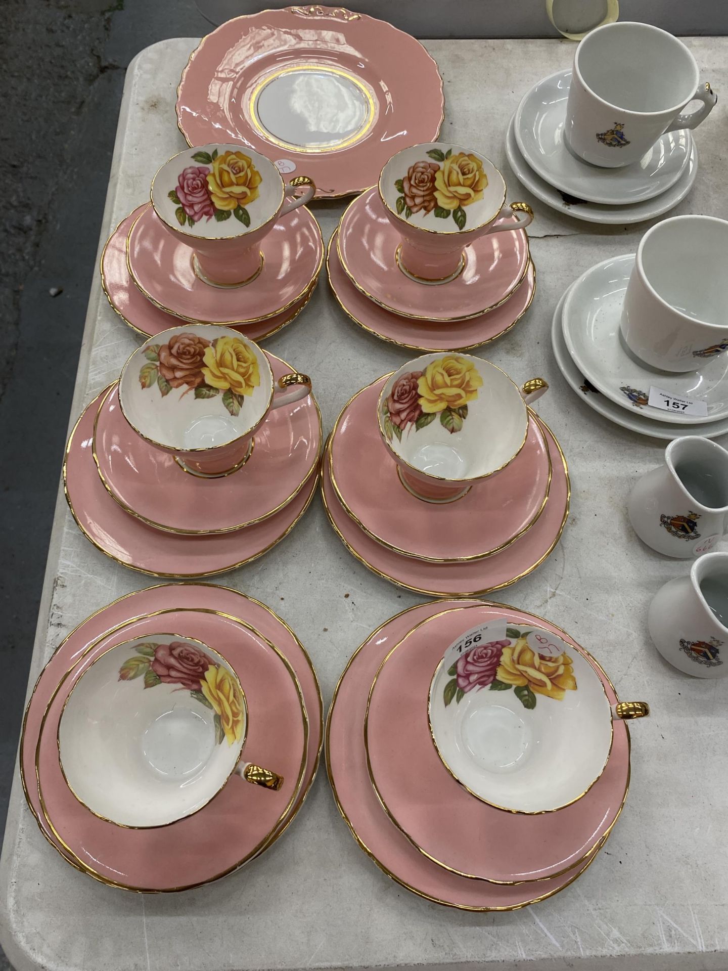 SIX VINTAGE AYNSLEY TRIOS PLUS A CAKE PLATE WITH A PINK AND ROSE PATTERN