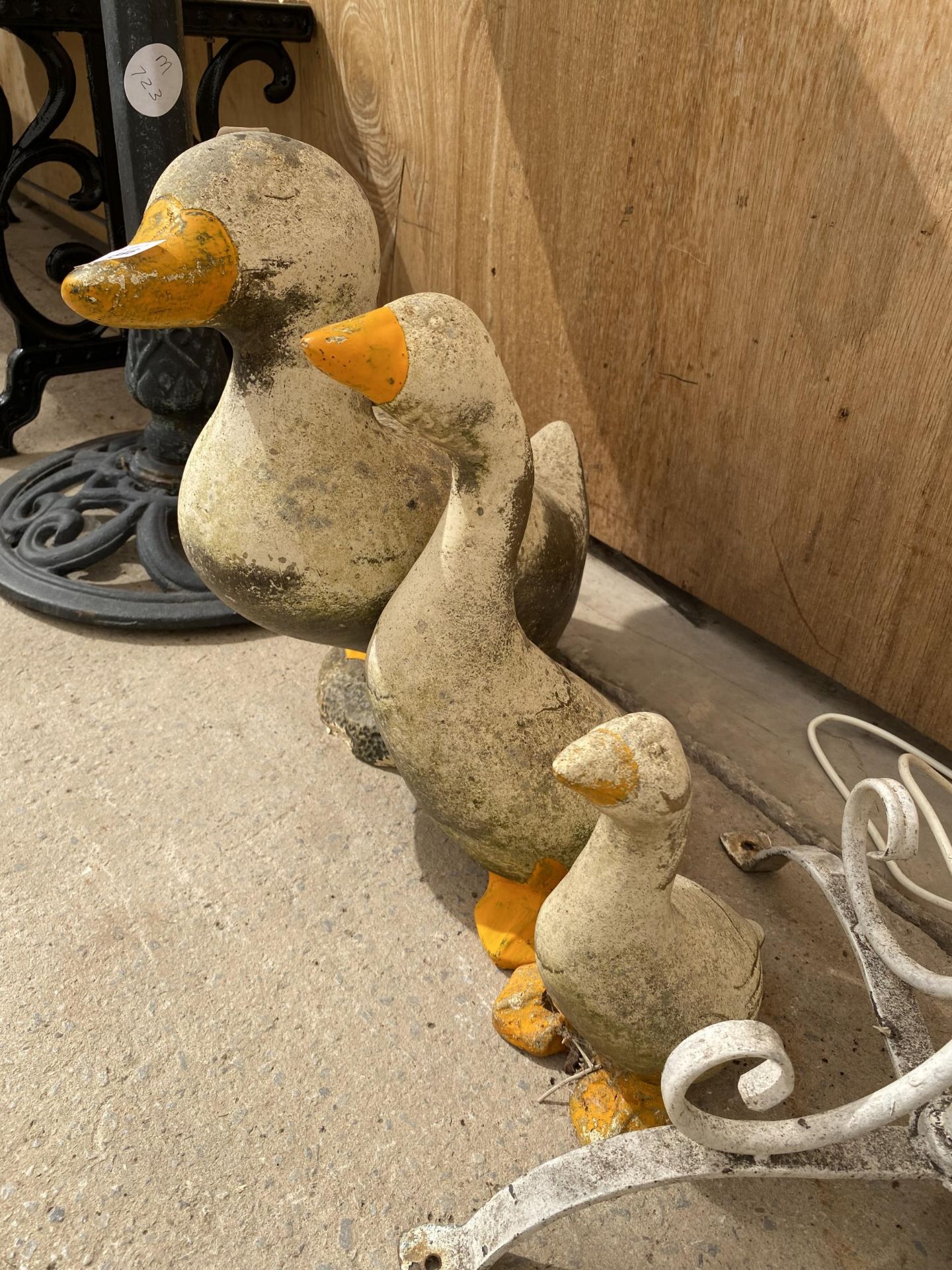 THREE GRADUATED PAINTED RECONSTITUTED STONE DUCK FIGURES - Image 2 of 3