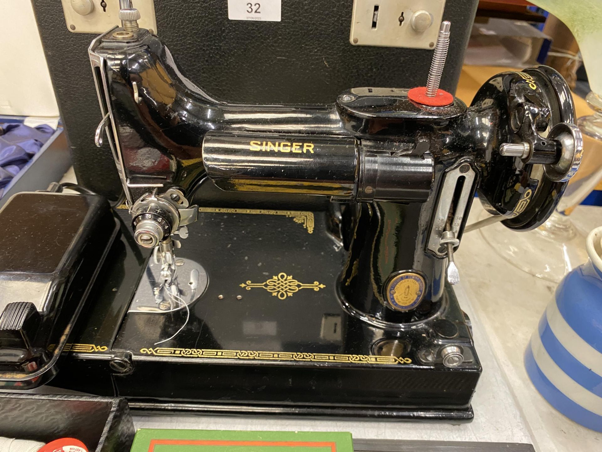 A VINTAGE SINGER PORTABLE SEWING MACHINE, MODEL 221K1, WITH INSTRUCTION MANUAL, SPOOLS, PEDAL, - Image 2 of 8