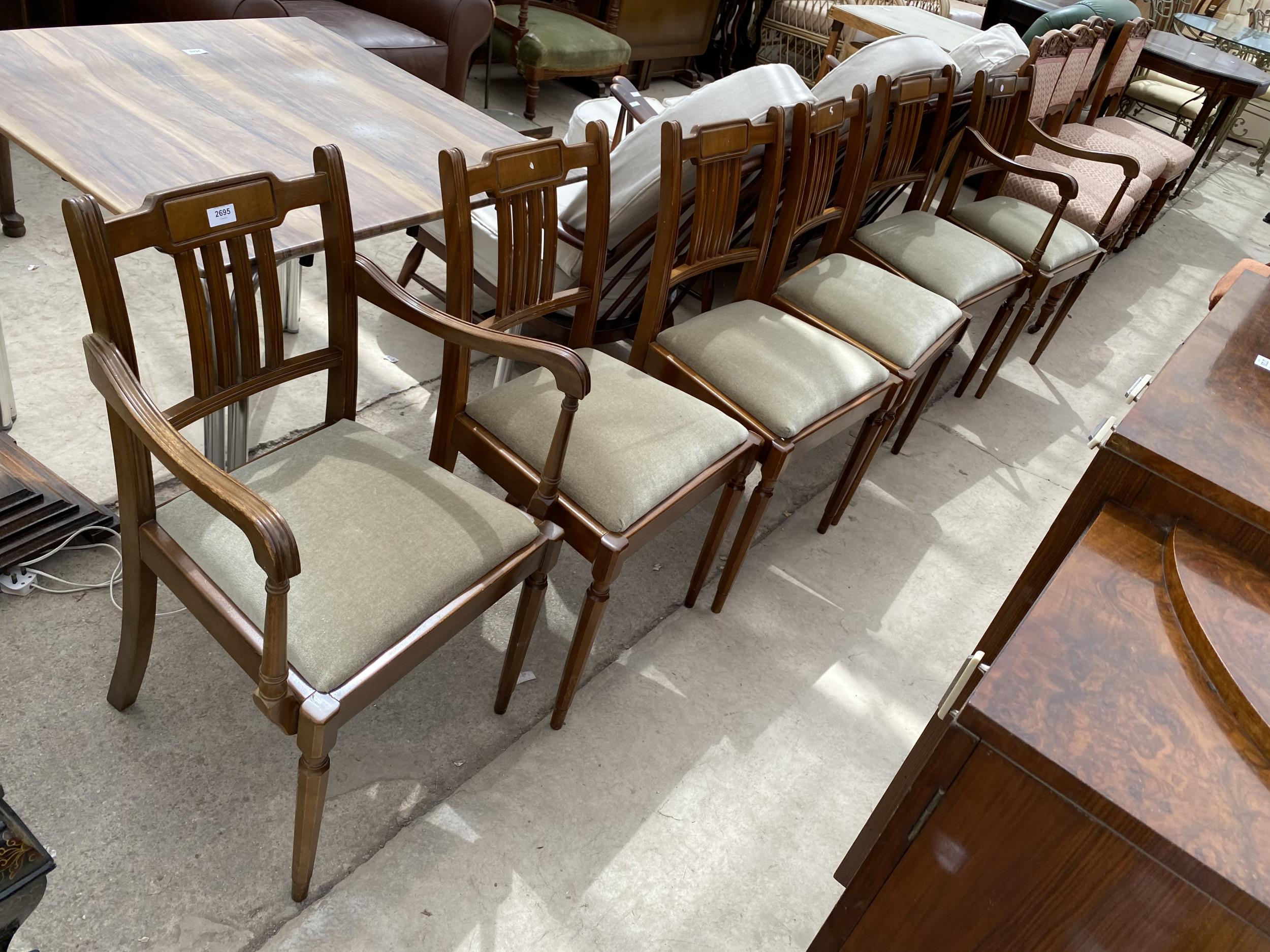 A SET OF SIX MAHOGANY DINING CHAIRS, TWO BEING CARVERS