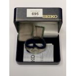 A BOXED LADIES SEIKO WITH BARK EFFECT STRAP