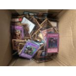 A BOX OF ASSORTED YU-GI-OH CARDS