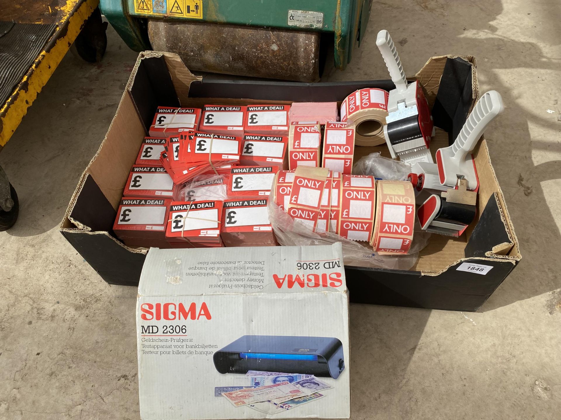 A BOX OF ASSORTED PRICING LABELS AND TWO TAPE GUNS ETC