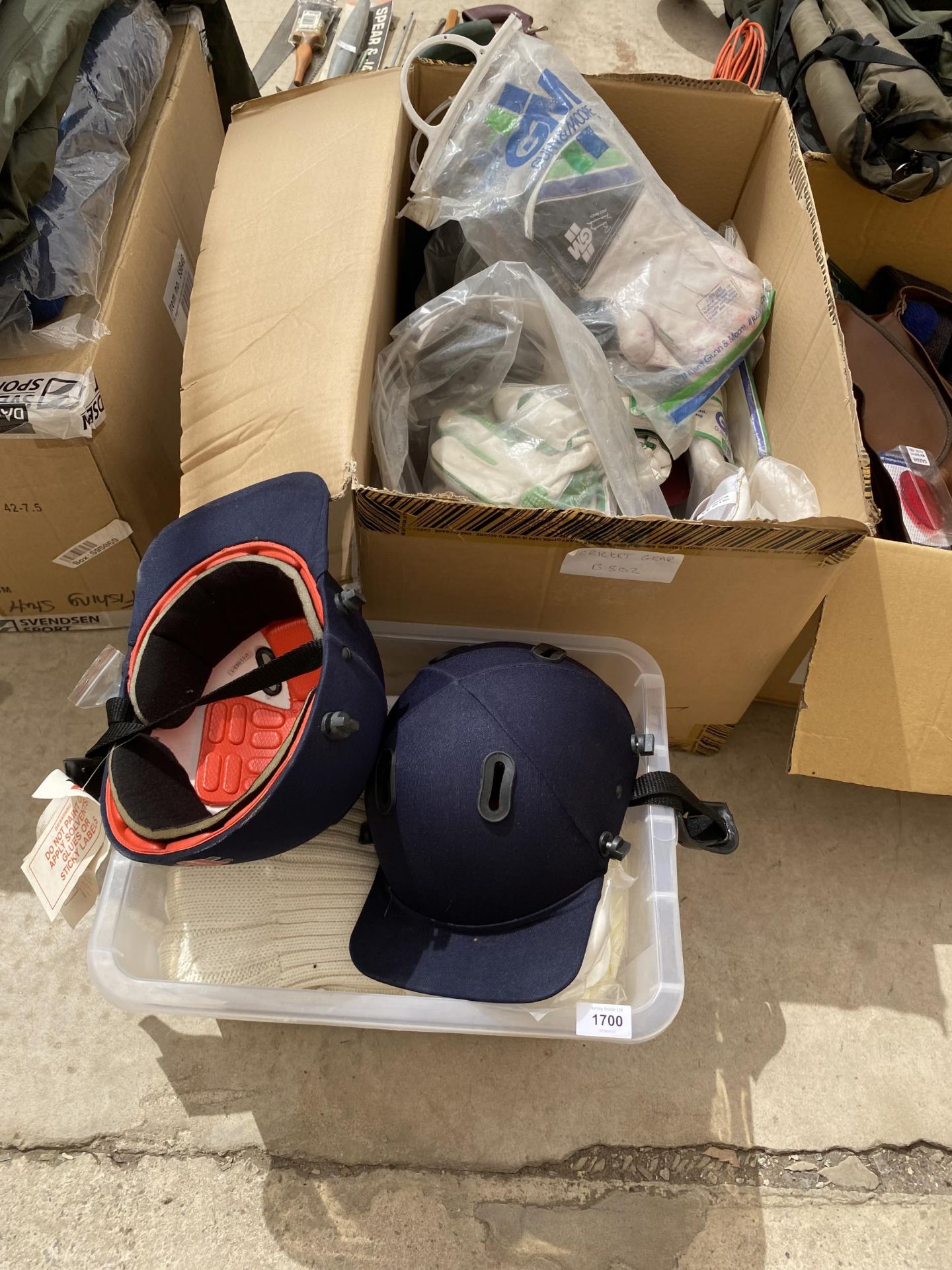 AN ASSORTMENT OF AS NEW CRICKET KIT TO INCLUDE HATS AND GLOVES (FROM A TACKLE SHOP CLEARANCE)
