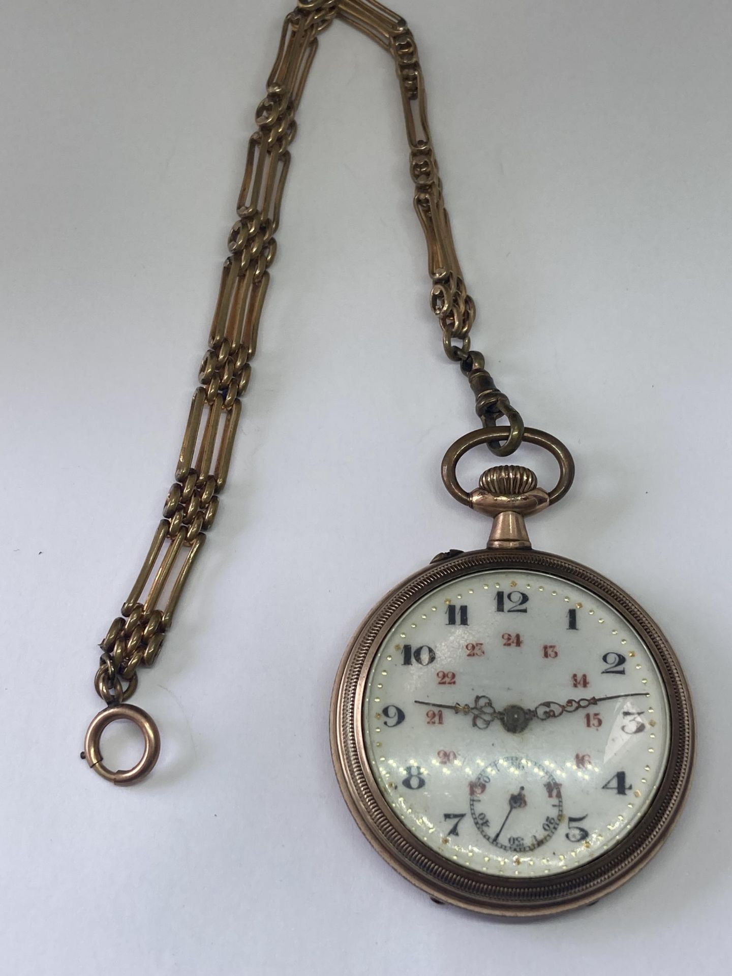 A GOLD PLATED POCKET WATCH WITH CHAIN