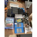 AN ASSORTMENT OF ITEMS TO INCLUDE A SONY PS2, PLAYSTATION ONE GAMES AND CONTROLLERS AND A NINTENDO