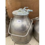 A STAINLESS STEEL MILKING BUCKET WITH LID