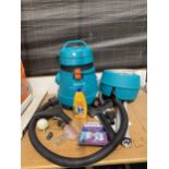 A HOOVER AQUAJET 5000 CARPET CLEANER WITH VARIOUS ATTATCHMENTS
