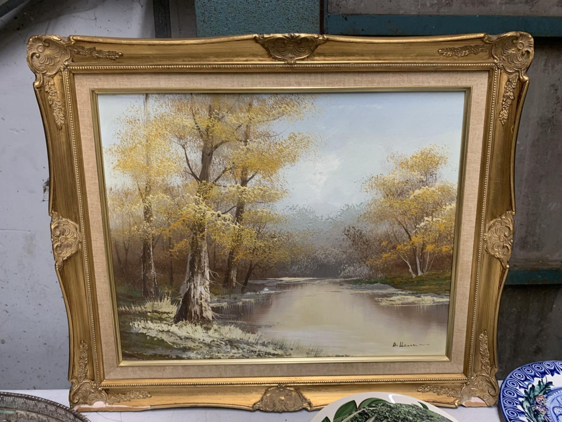 AN OIL ON BOARD OF A WOODLAND LAKE SCENE, SIGNED, IN GILT FRAME 63CM X 54CM