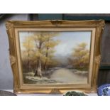 AN OIL ON BOARD OF A WOODLAND LAKE SCENE, SIGNED, IN GILT FRAME 63CM X 54CM