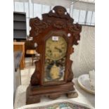 A VINTAGE 'B.YOUELL & SONS' WOODEN CASED CLOCK