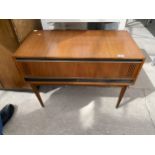 A RETRO TEAK RADIOGRAM WITH PHILIPS RECORD DECK