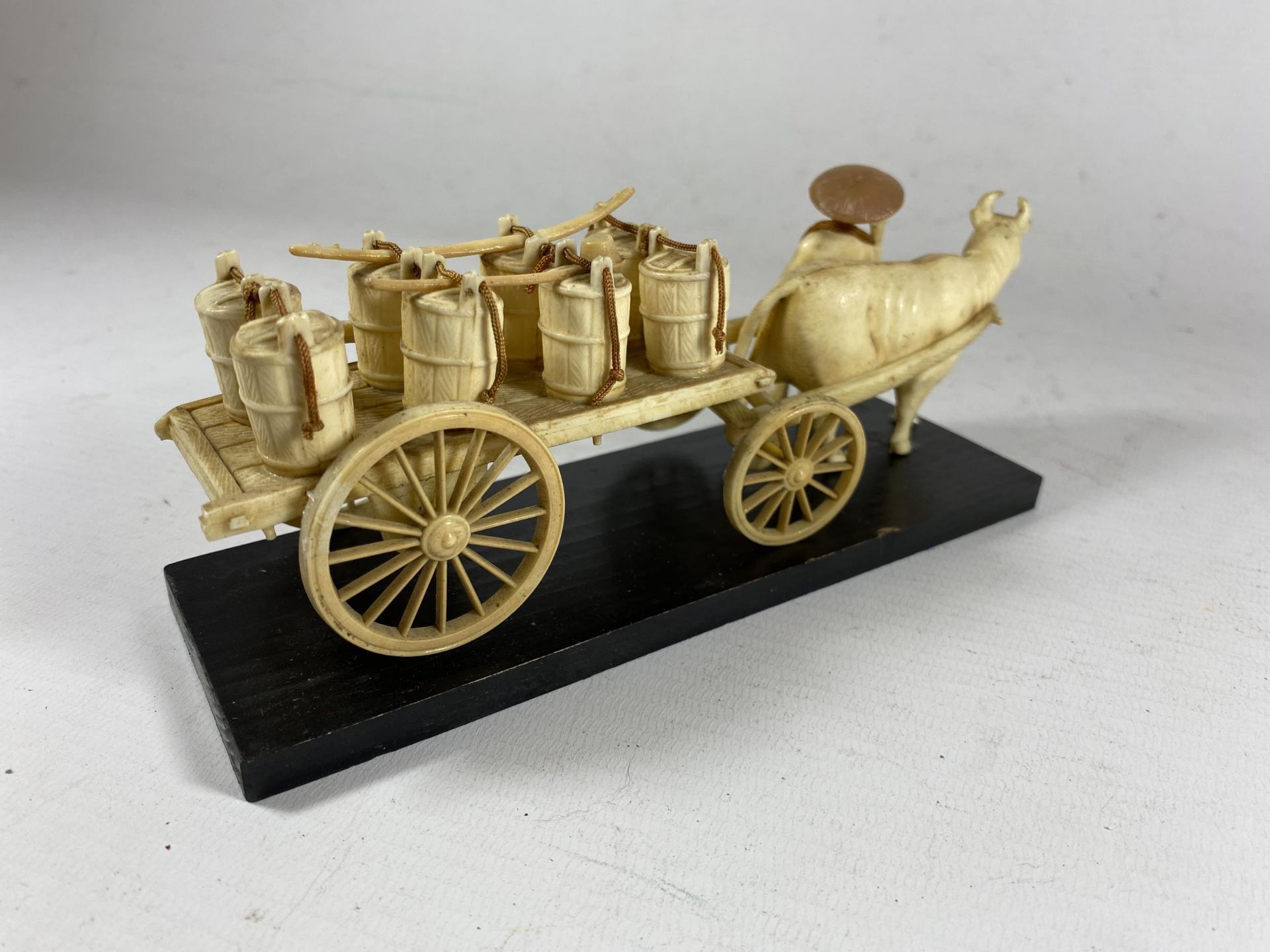 AN ORIENTAL BONE EFFECT MODEL OF A CHINESE MAN WITH HORSE AND CART - Image 4 of 4