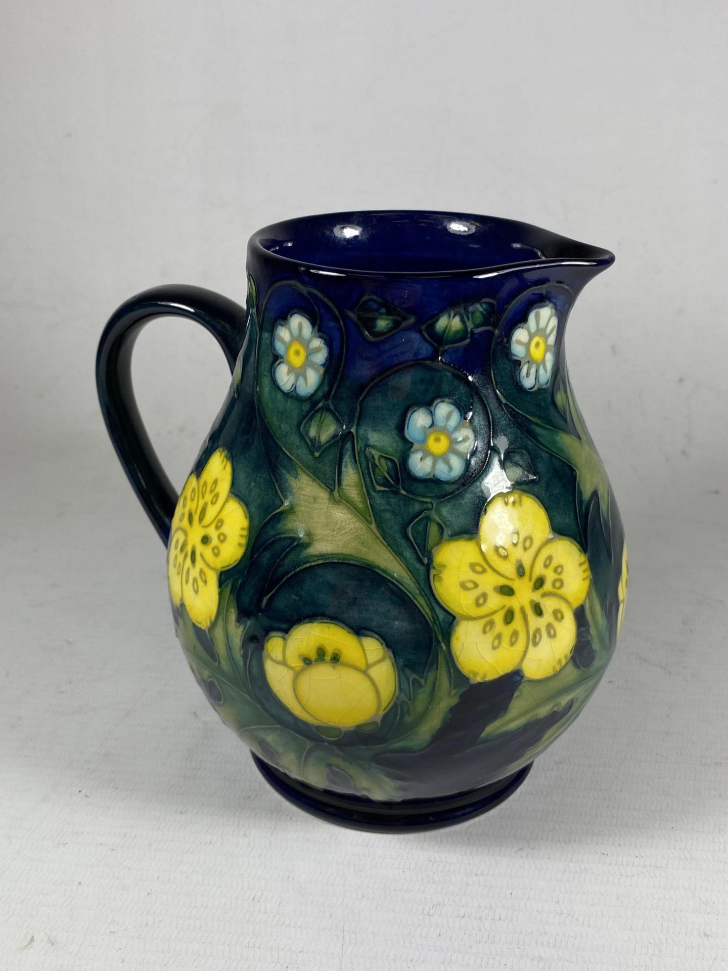 A MOORCROFT POTTERY BUTTERCUP PATTERN JUG BY SALLY TUFFIN - Image 2 of 3