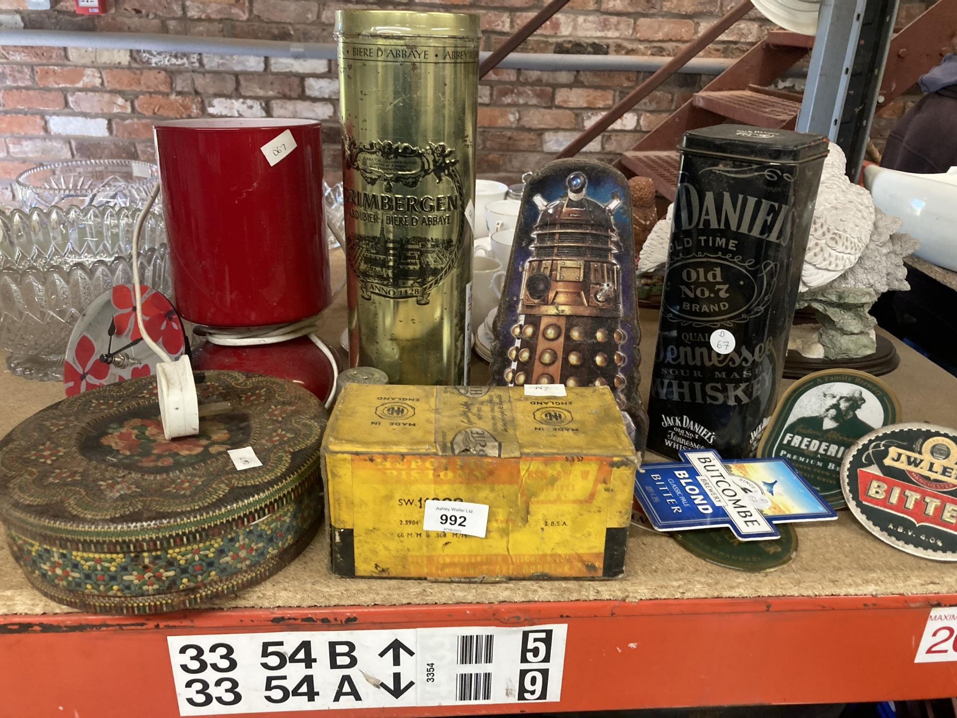 A COLLECTION OF VINTAGE TINS PLUS BEER PUMP FRONTS