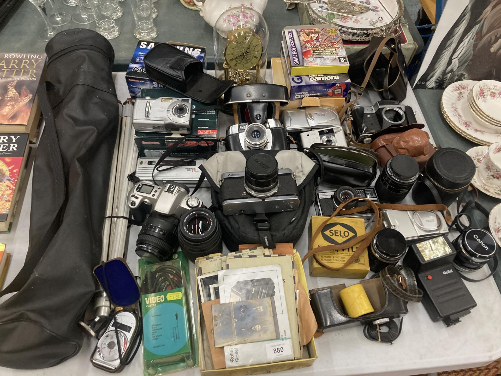 A LARGE QUANTITY OF CAMERAS AND ACCESSORIES TO INCLUDE A CANON EOS 500, HALINA PAULETTE, OLYMPUS C-