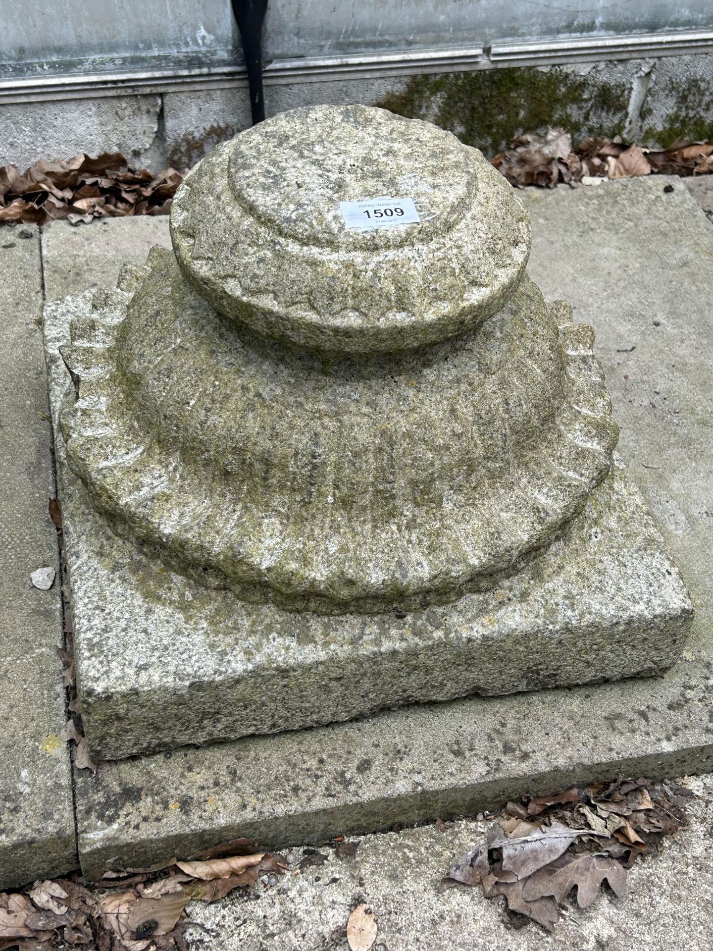 A VINTAGE INDIAN STONE COLUMN BASE