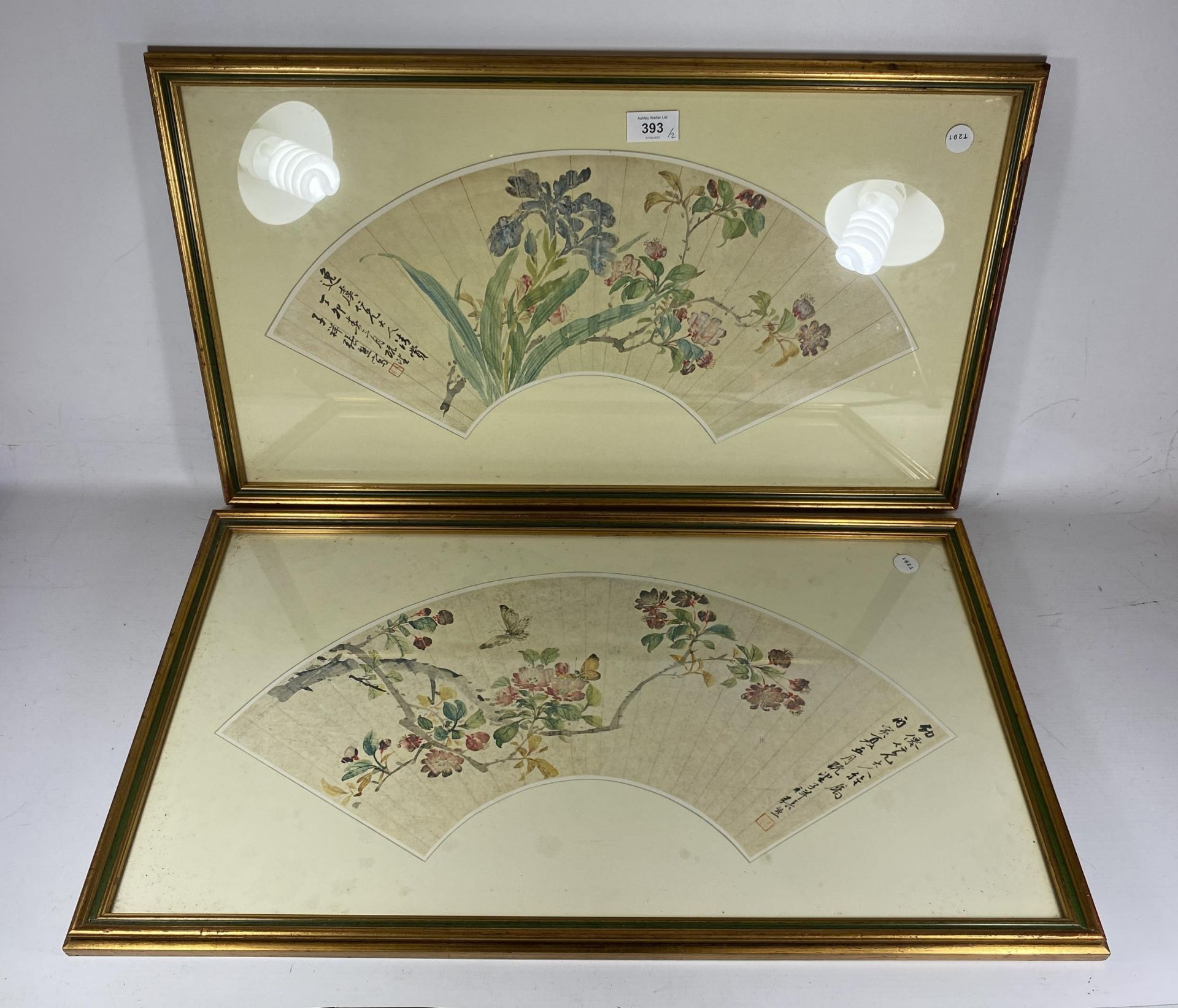 A PAIR OF GILT FRAMED ORIENTAL FAN DESIGN FLORAL PRINTS, 37 X 65CM