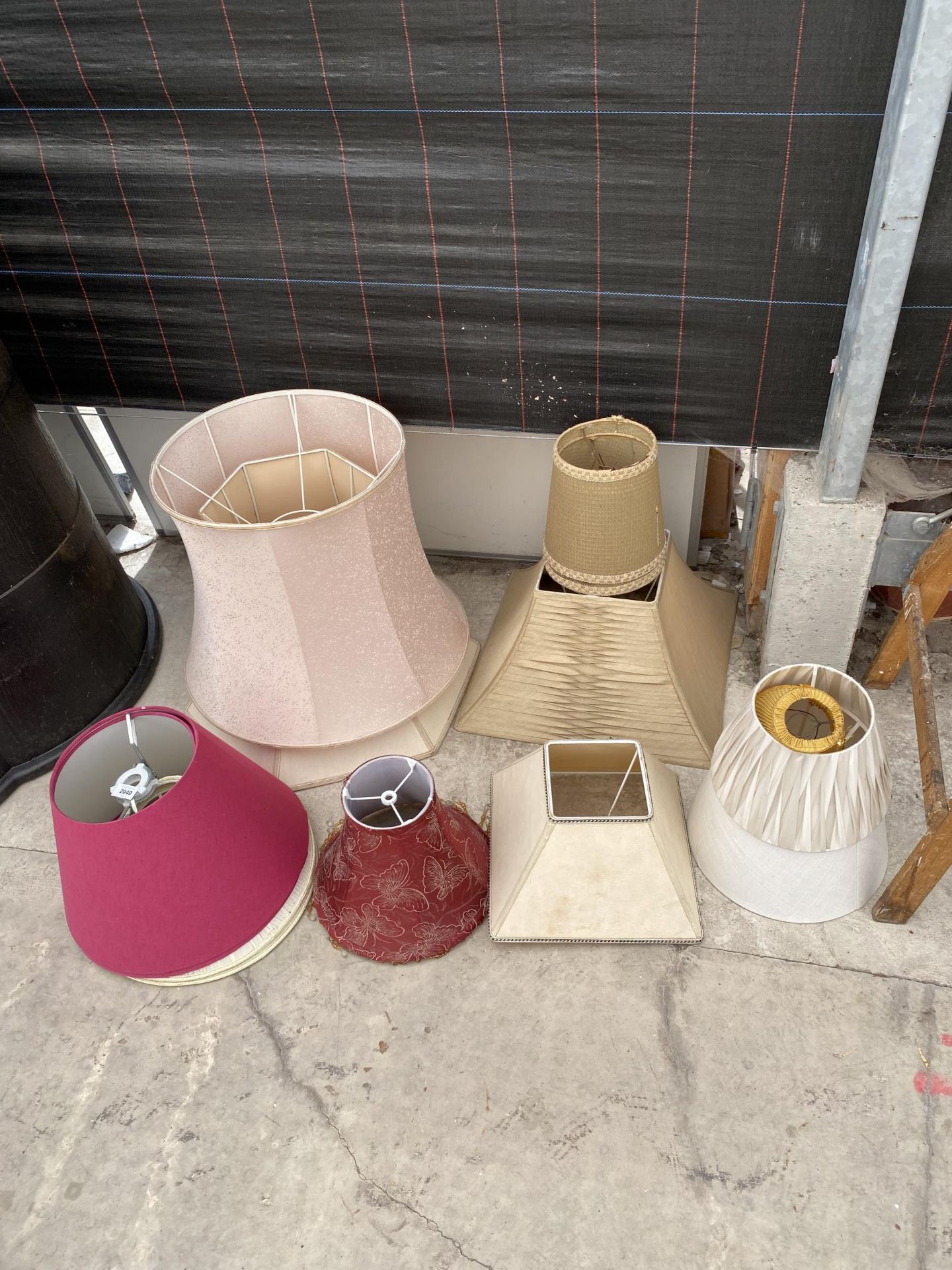 AN ASSORTMENT OF VARIOUS LAMP SHADES