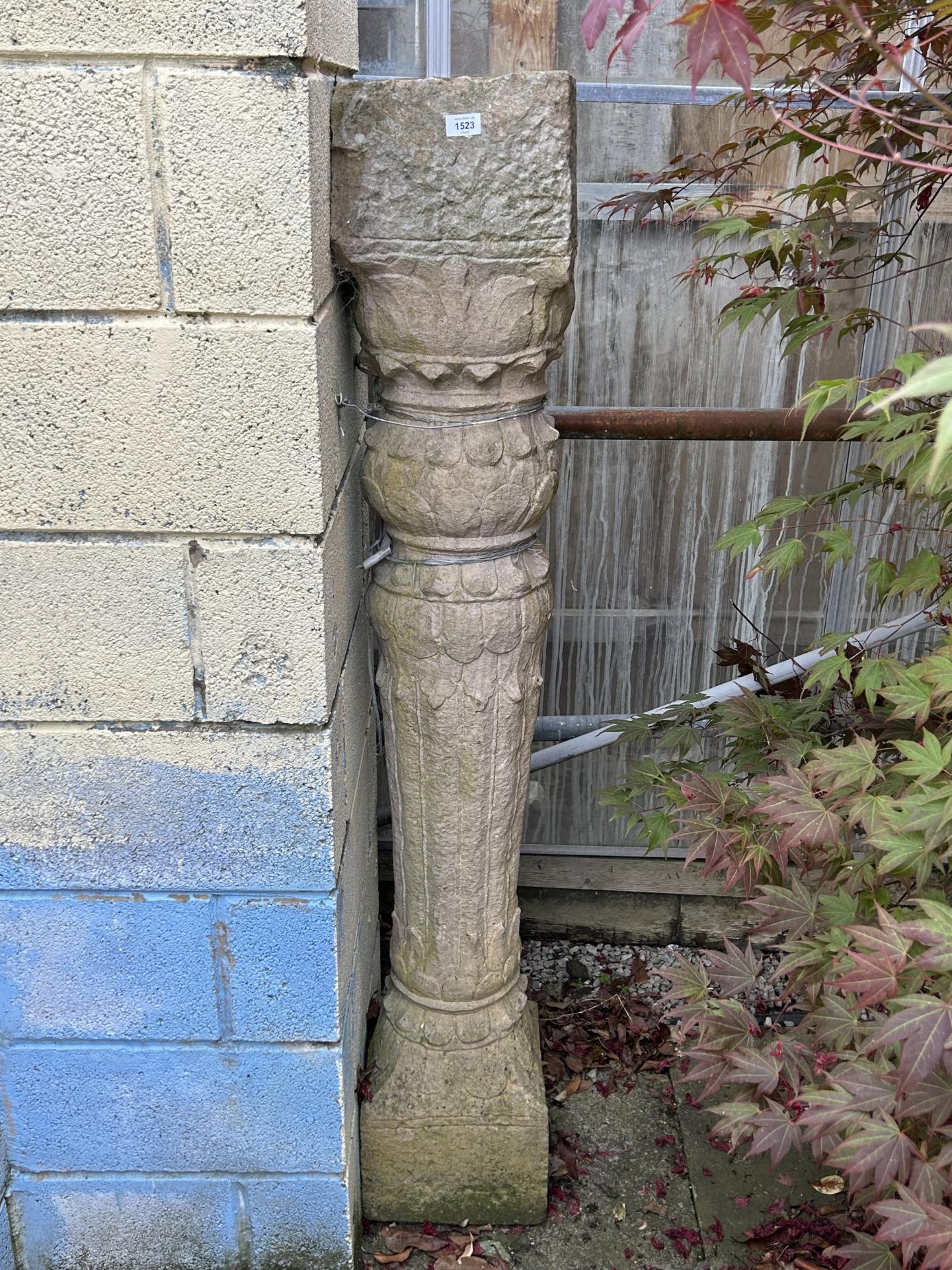 A VINTAGE INDIAN STONE COLUMN, 64" HIGH 10" WIDE