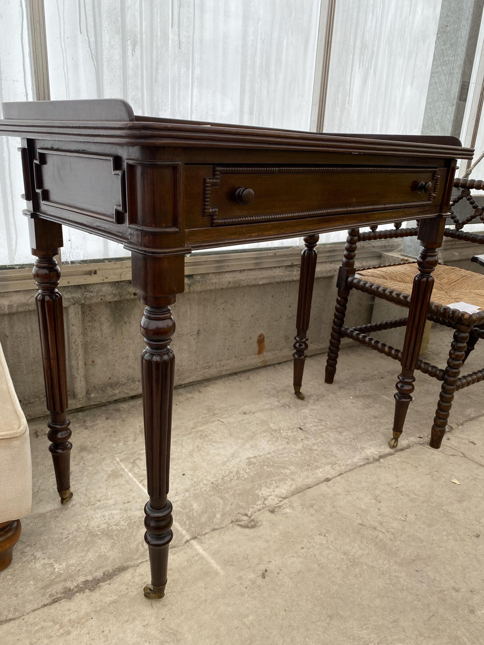 A REGENCY STYLE MAHOGANY SIDE-TABLE WITH GALLERY BACK, SINGLE DRAWER, ON TURNED AND FLUTED LEGS, 32" - Image 2 of 5