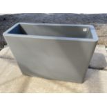 AN AS NEW GREY PLASTIC ELHO EASY MOVE RECTANGULAR TROUGH PLANTER (78CM x 59CM x 29CM)