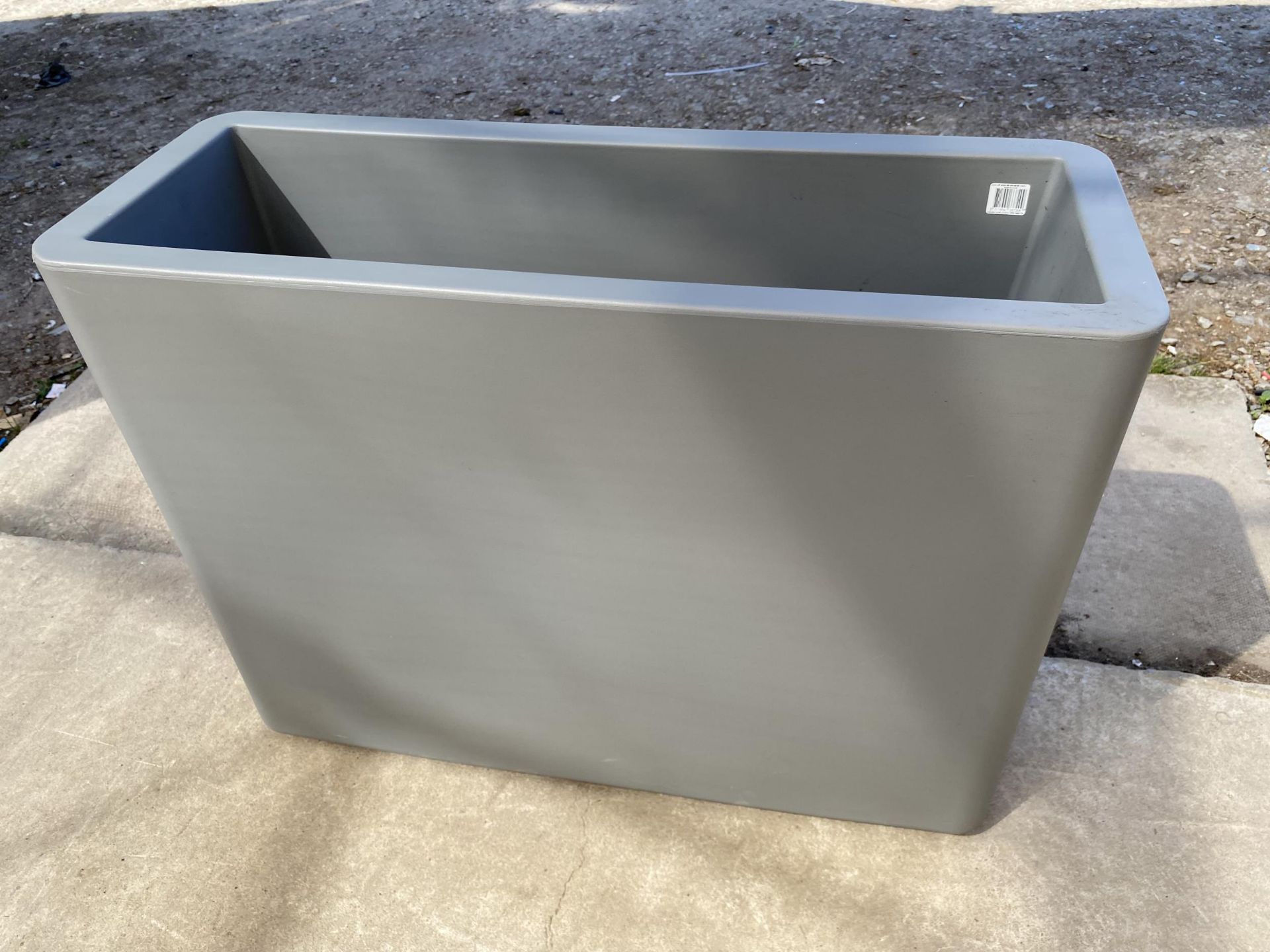 AN AS NEW GREY PLASTIC ELHO EASY MOVE RECTANGULAR TROUGH PLANTER (78CM x 59CM x 29CM)