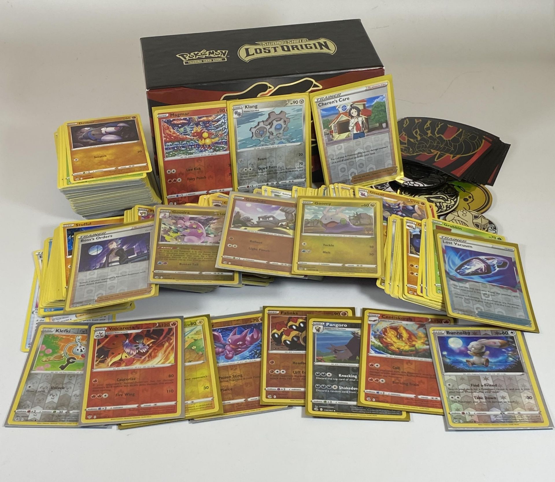 APPROXIMATELY 350 POKEMON CARDS IN A TRAINER BOX, HOLOS, GAME COUNTERS ETC