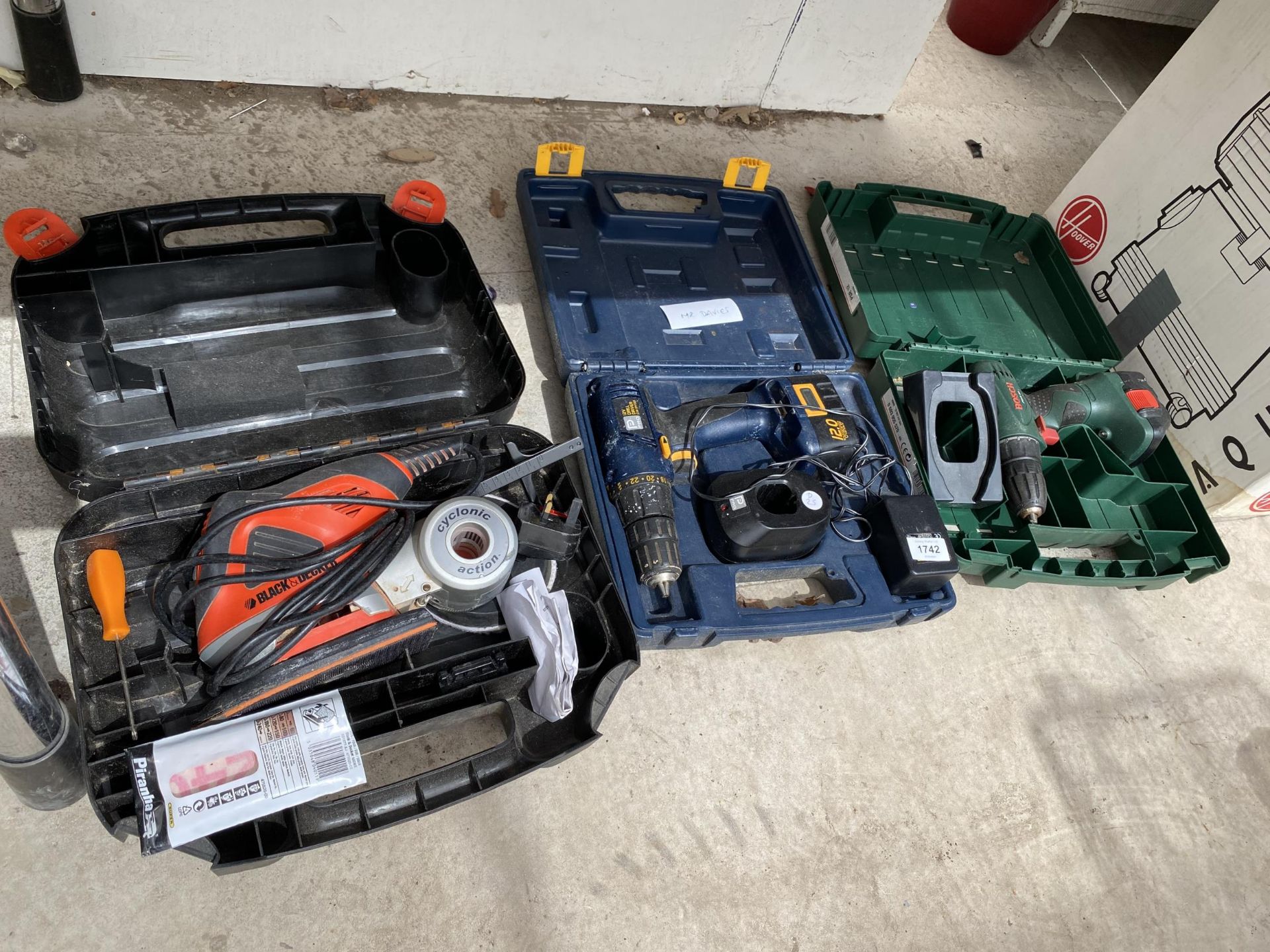 THREE POWER TOOLS TO INCLUDE A BOSCH DRILL AND A BLACK AND DECKER SANDER ETC