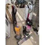 THREE VARIOUS VACUUM CLEANERS TO INCLUDE A DYSON AND TWO VAX