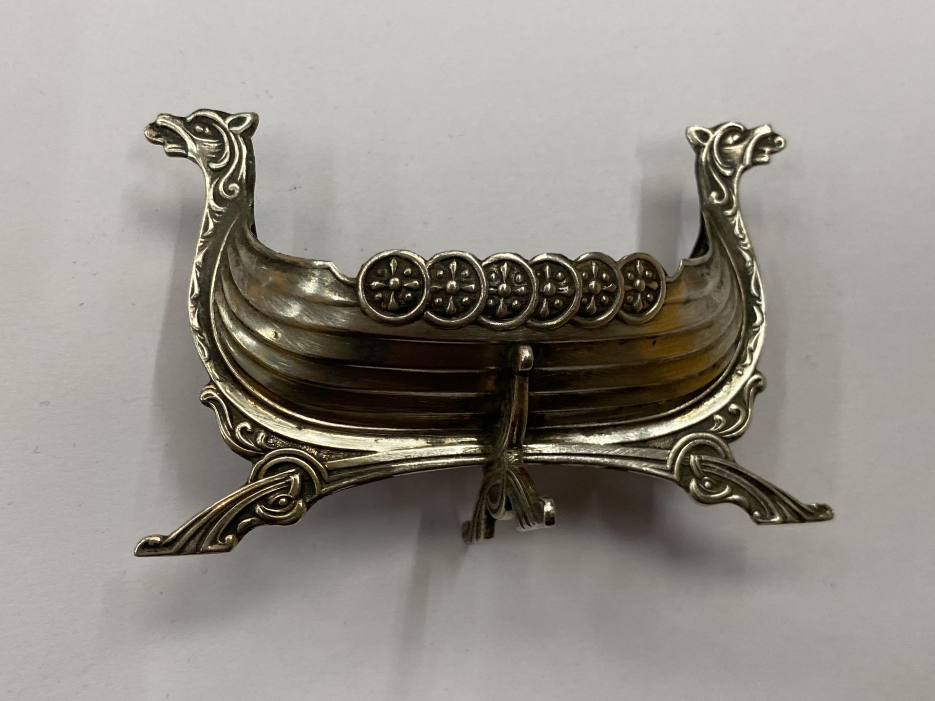 A SILVER VIKING BOAT MODEL