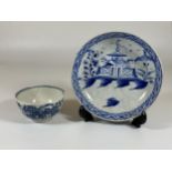A MID-LATE 18TH CENTURY WORCESTER TEA BOWL WITH CRESCENT MOON MARK, (A/F) TOGETHER WITH MATCHING