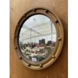 A CIRCULAR WOODEN PORTHOLE STYLE WALL MIRROR