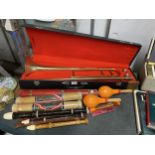 A MIXED LOT OF MUSICAL ITEMS, CASED MELODY BRASS TRUMPET, SHAKERS, FLUTES ETC