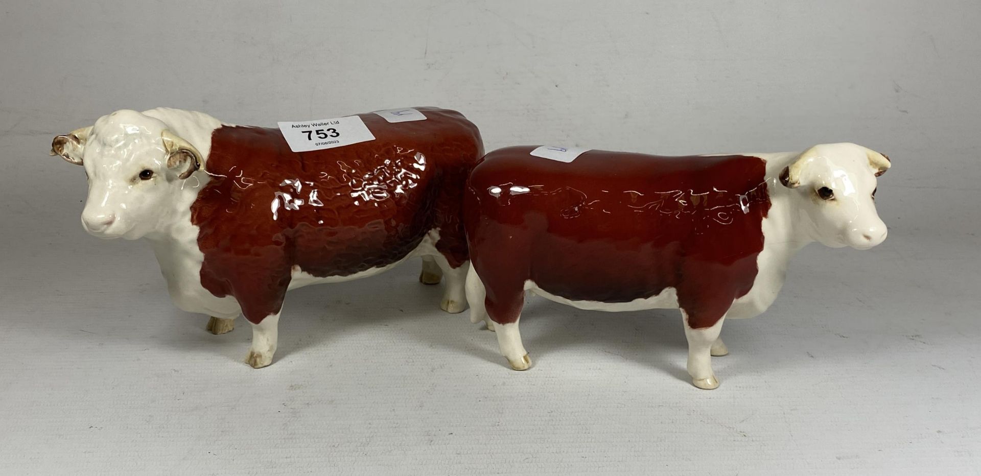 TWO BESWICK CHAMPION OF CHAMPIONS HEREFORD BULL AND COW CATTLE FIGURES