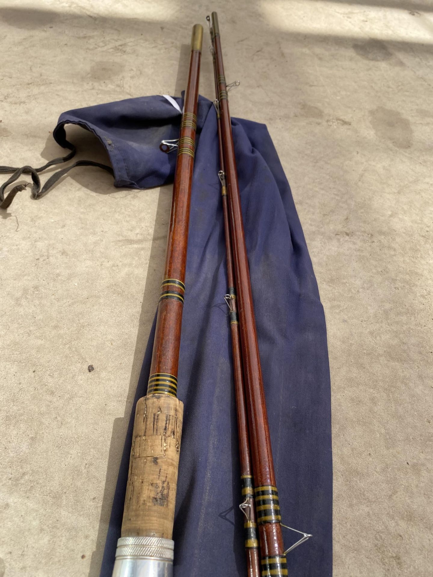 A THREE SECTION FIBRE GLASS AND BRASS COURSE FLOAT FISHING ROD - Image 2 of 2