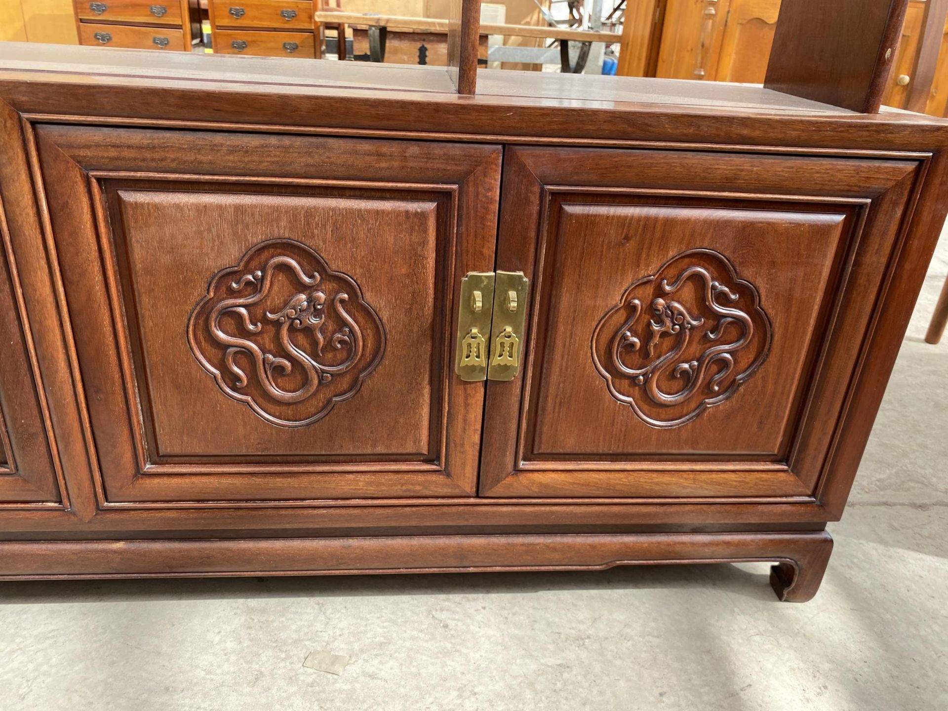 AN ASIAN HARDWOOD OPEN DISPLAY SHELVES WITH FOUR PANEL DOORS TO THE BASE, 58" WIDE, 12" DEEP AND 75" - Image 4 of 8